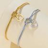 Cazador Stainless Steel Hollow Heart Charm Bracelet for Women Love Knot Snake Chain Bracelet Birthday Gift 2026 New