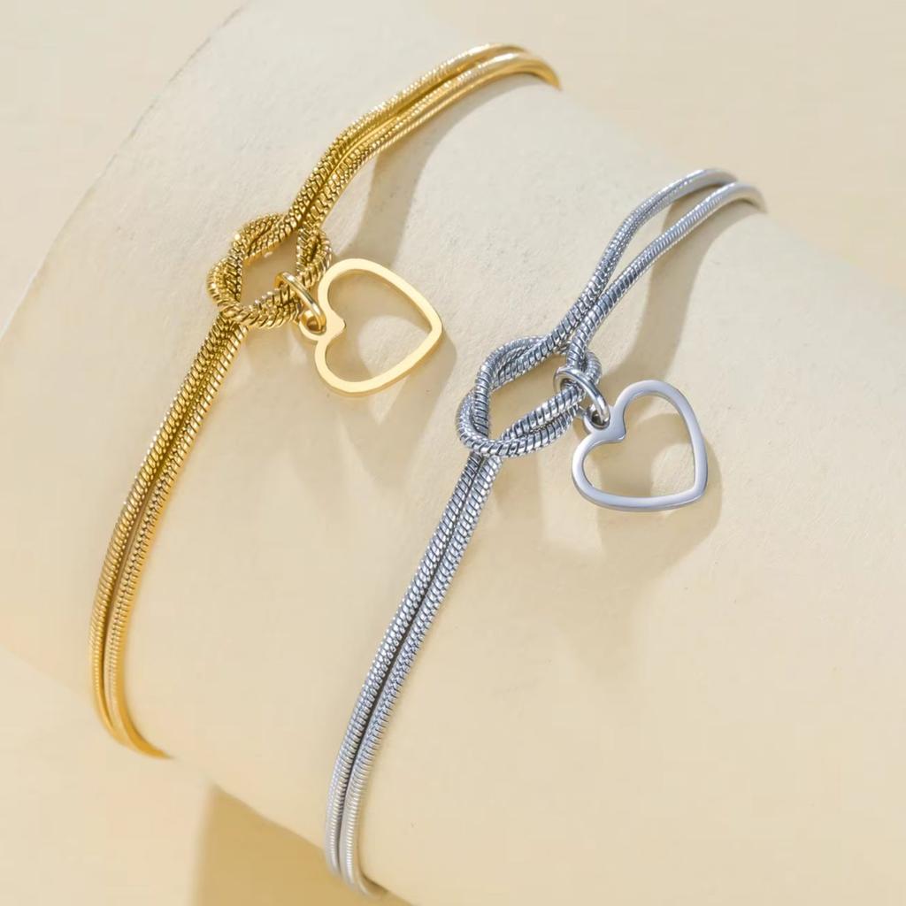 Cazador Stainless Steel Hollow Heart Charm Bracelet for Women Love Knot Snake Chain Bracelet Birthday Gift 2026 New