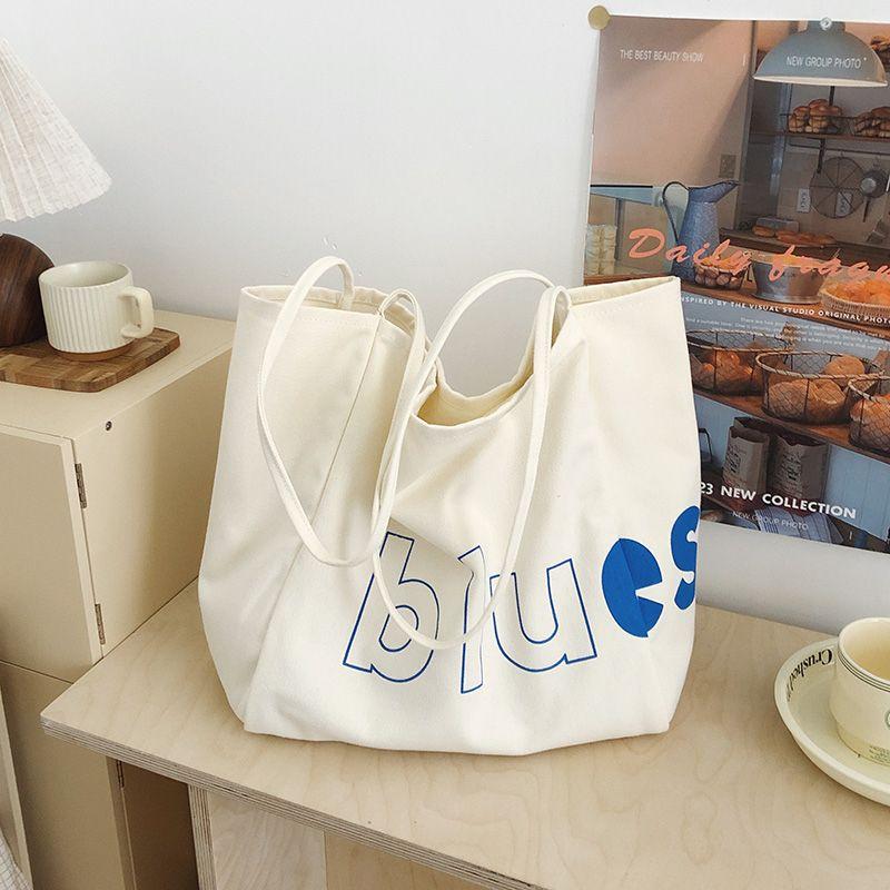 

Summer Summer Large Capacity Work Clothing One-Shoulder Tote Bag Female 2025 New Arrival Casual Class Satchel Canvas Bag Fashion Beige White