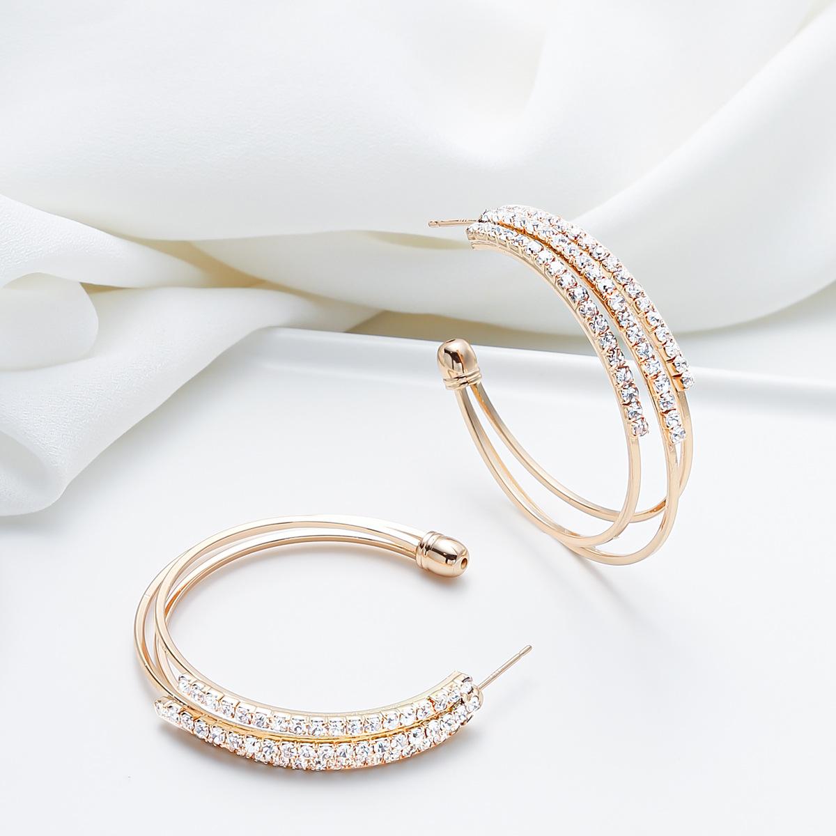 

C-shaped stud earrings inlaid with zircon multi-layer earrings Design temperament earrings earrings