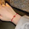 Yi Yangqianxi's Red Flower Hand-Woven Ethnic Bracelet for Women