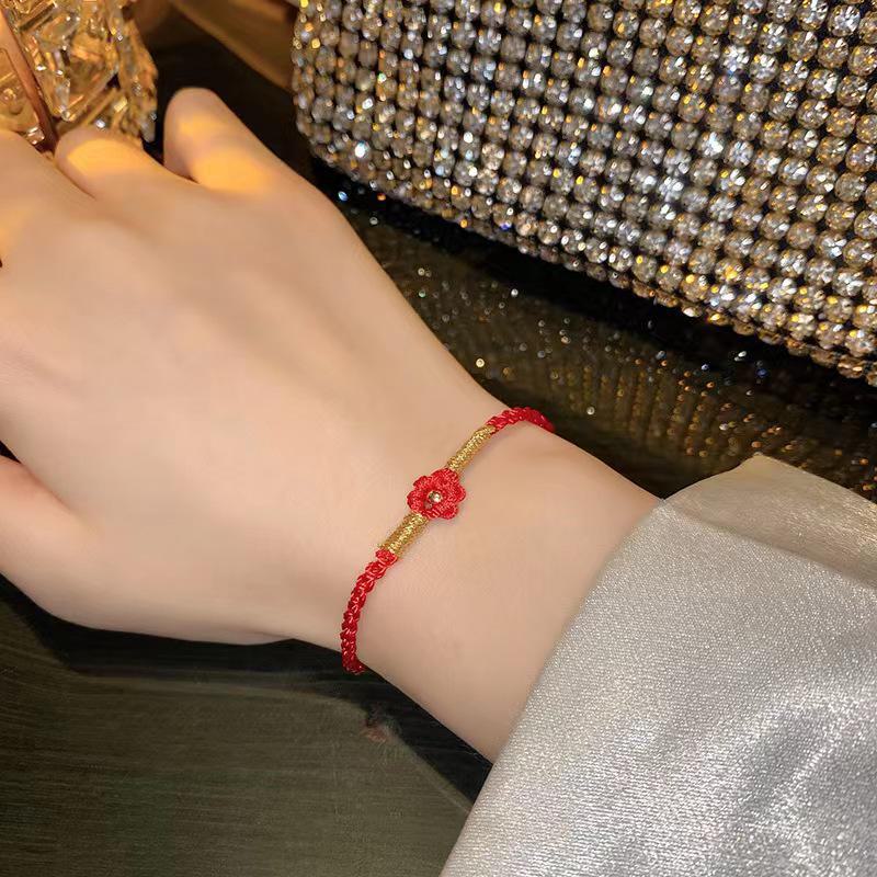 Yi Yangqianxi's Red Flower Hand-Woven Ethnic Bracelet for Women