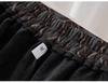 Women's Flocked Plaid Skirt 2026: Winter Elastic High Waist A-line Hip-Covering Skirt