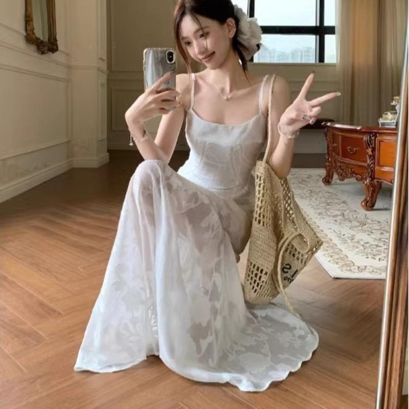 Summer new French fresh and sweet suspender dress women's seaside vacation wear waist medium and long skirt