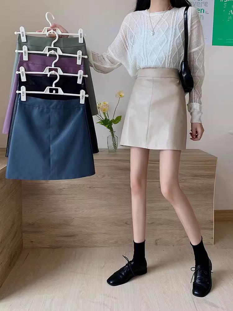 Women's 2023 Retro High-Waist PU Leather Skirt - Slim, Short, Black, Korean-Style for Autumn/Winter Fashion.