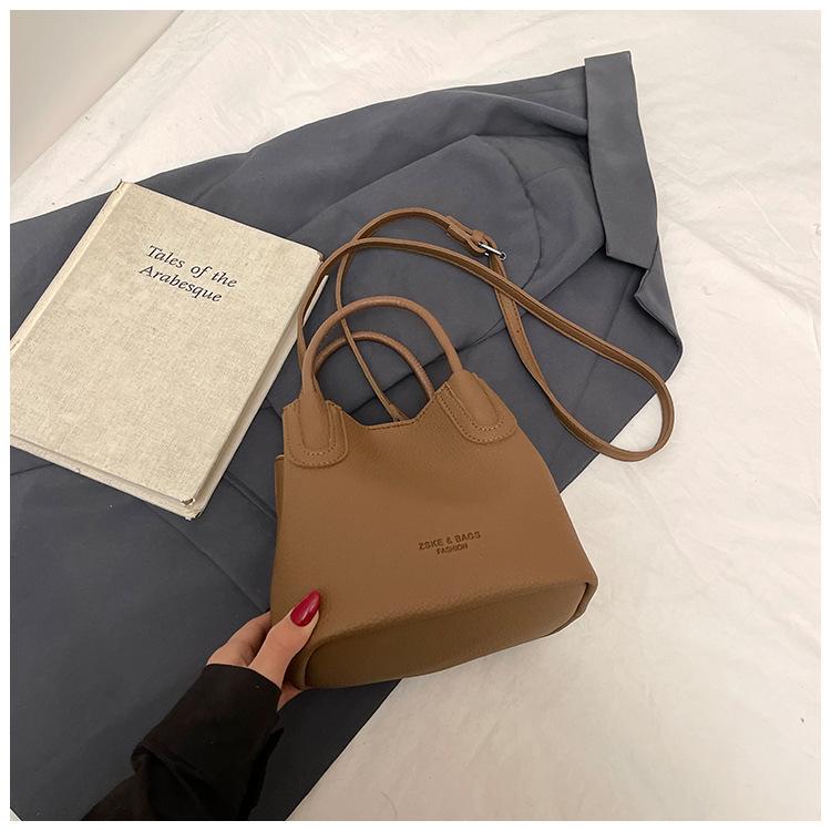 Textured foreign style small bag women's 2025 spring new popular versatile messenger bag fashionable women's portable bucket bag