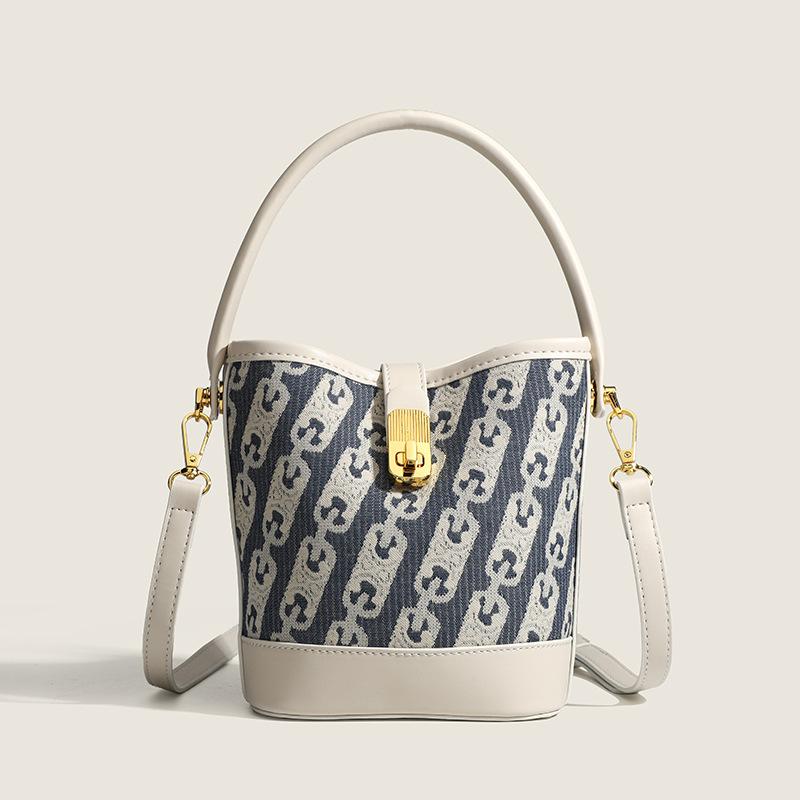 New Niche Design Simple Canvas Bucket Bag Versatile Large Capacity Commuter Portable Shoulder Messenger Bag Handbags