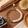 French Retro Pearl Patchwork Chunky Chain Bracelet with OT Buckle, Titanium Steel, Gold-Plated Hand Jewelry for Women.