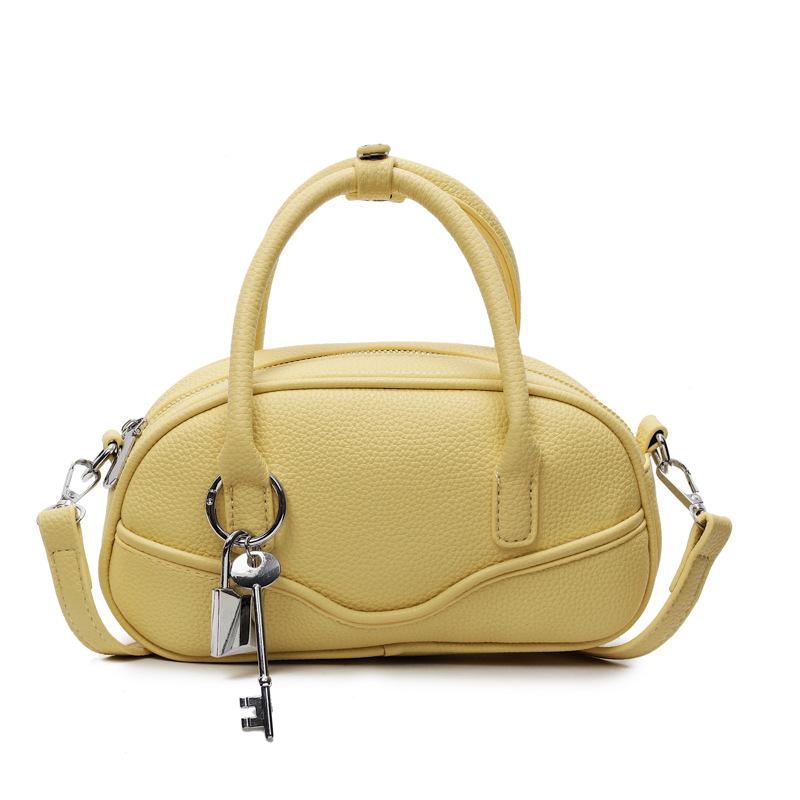 New textured portable bowling bag women's 2025 spring fashion simple shoulder messenger bag popular small square bag