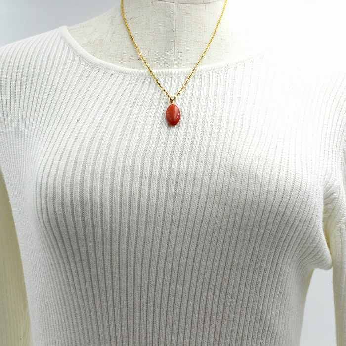 Peach coral oval pendant with 18K gold hardware gift wrapping and gift tag Includes a 45cm plated chain be changed to an 18K gold chain Undyed coral