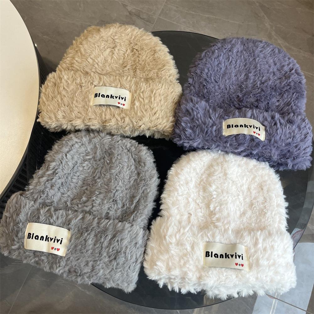 

New loose large version plush wool hat for women, warm in autumn and winter, student big head circumference, ear protection hat shows small face Adult average size чорний