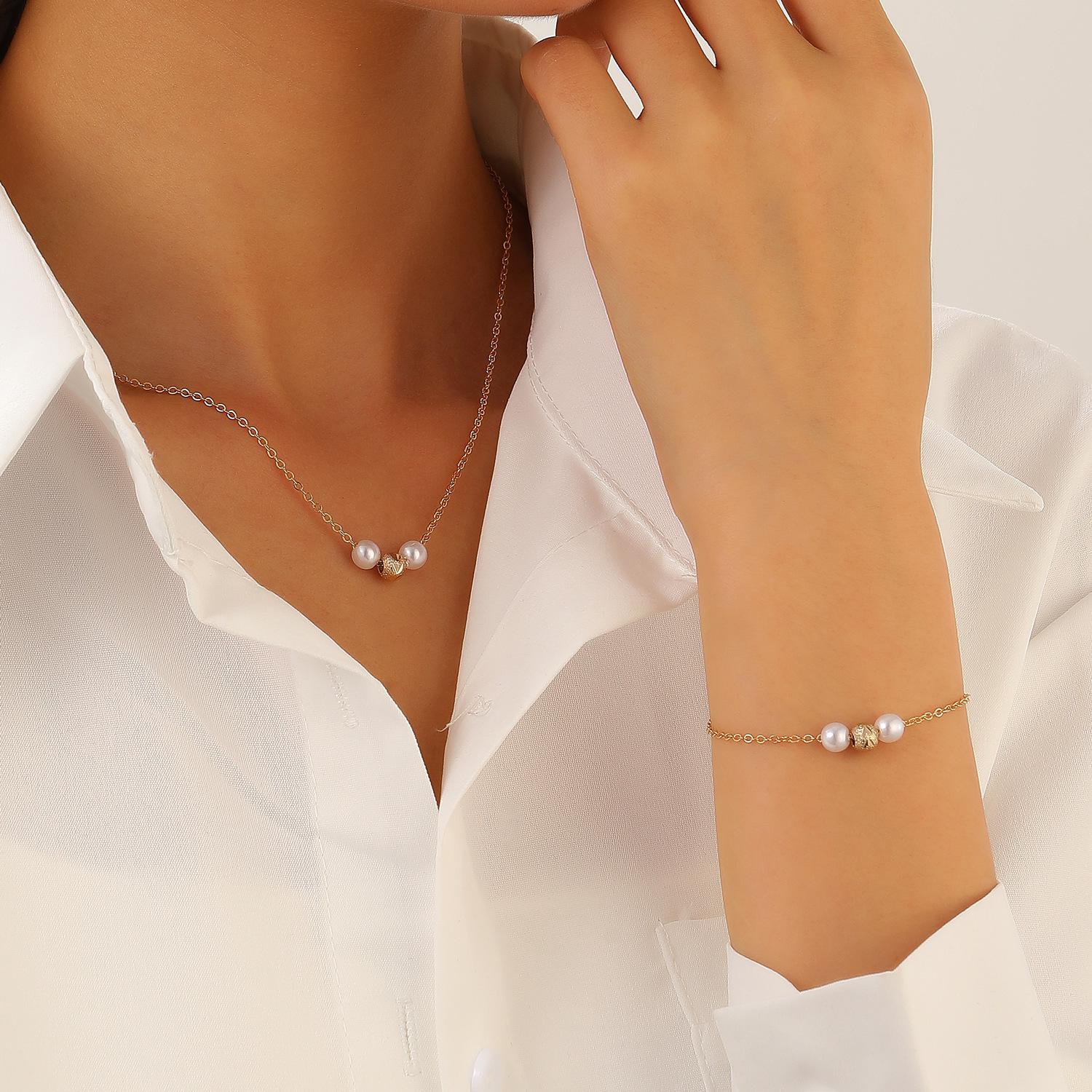 

Жіночий ювелірний набір високого класу в європейському та американському стилі: Двошаровий перловий чокер, намисто на ключицю, браслет та сережки