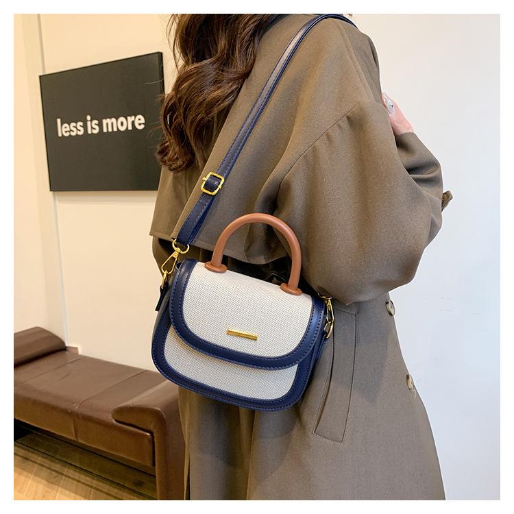 Borsa a sella portatile con texture premium da donna, nuova borsa a tracolla messenger retrò alla moda con inserti a contrasto di colore
