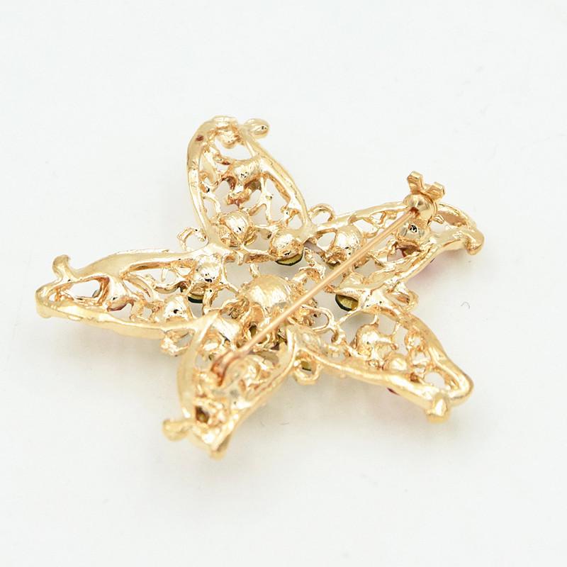 Gold-Plated Christmas Star Brooch with Colored Diamonds - Festive Clothing Accessory