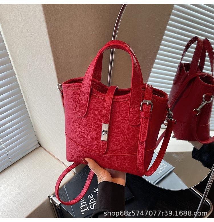 Commuter fashion hand-held small bag women's 2025 new versatile large-capacity one-shoulder crossbody bag simple temperament bucket bag