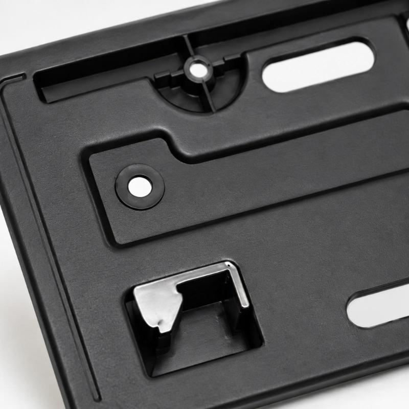 Black ABS Front License Plate Bracket, Replacement Mount with Multiple Mounting Points and 6 Included Screws for the Stated Application