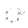 18K Gold Diamond Four-Leaf Clover Flower Bracelet in Textured Stainless Steel Jewelry