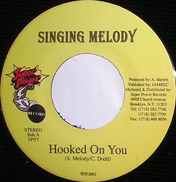 

7inch Record SINGING MELODY - Hooked On You SP07 Super Power 2003 Jamaica Reggae, Ska & Dub Used