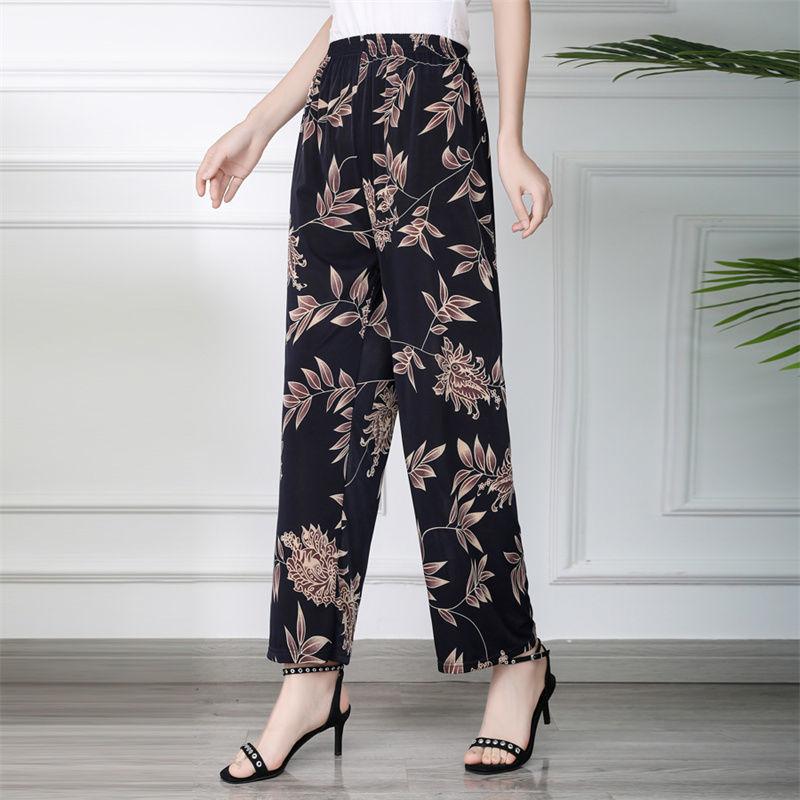 

Нові штани для мами середнього та похилого віку Літні квіткові штани Великого розміру Вільні жіночі штани Крижаний шовк Укорочені штани 5XL