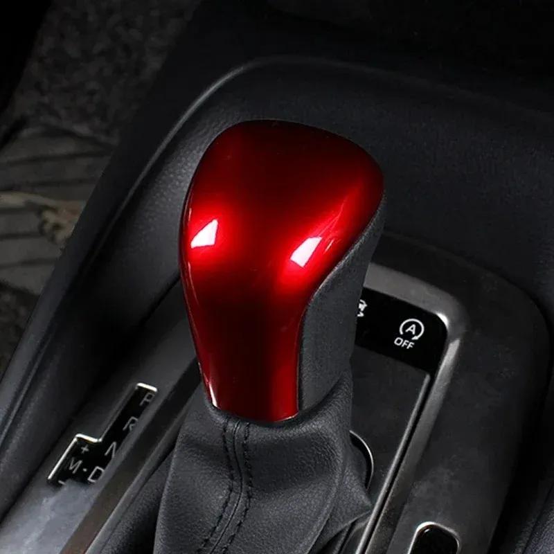 For Toyota Corolla E210 + Camry 2018+ Yaris Yaris cross + Avalon + Car Gear Head Shift Knob Cover Handball Sticker