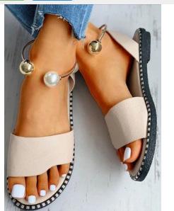 European and American one-word buckle flat sandals women's new open-toed simple pearl metal buckle cool slippers