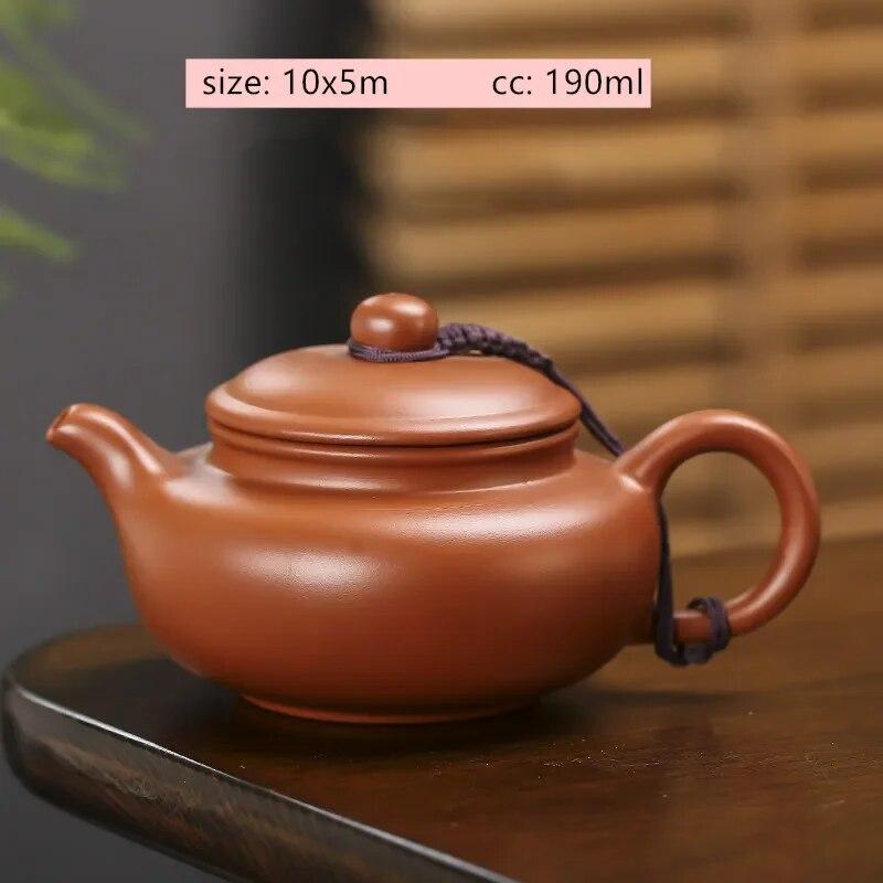 Starožitná fialová hliněná čajová konvička Surová ruda Zhu Mud Konvička Xishi Ručně vyráběná kulová dírka Filtr Beauty Pot Tradiční čajové sady Zisha