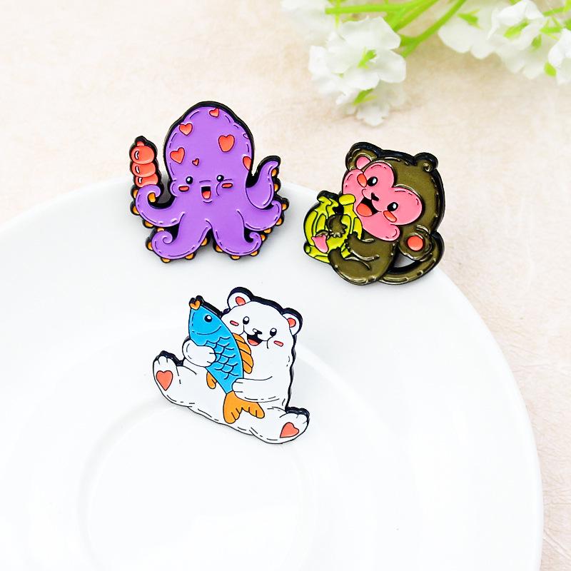 Animal-Themed Brooch: Monkeys with Bananas, Cats with Fish, Octopuses with Candied Hawthorns