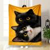 A Playful Black-and-white Cat with Bright Yellow Eyes On a Yellow Background. for All Seasons Blanket Lunch Break Throw Gift