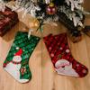 Christmas Playful Stockings In Rich Red And Green Fabric Featuring Snowflakes And Holiday Characters