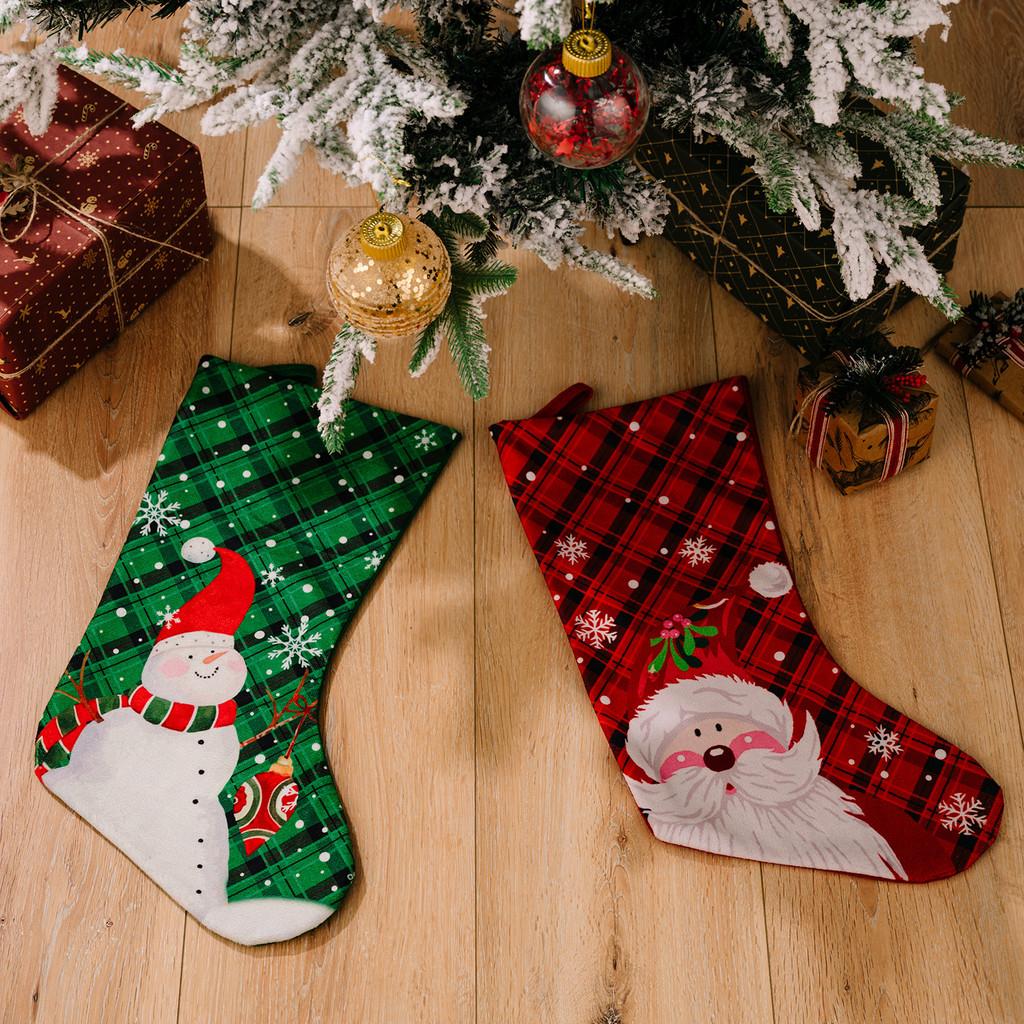 Christmas Playful Stockings In Rich Red And Green Fabric Featuring Snowflakes And Holiday Characters