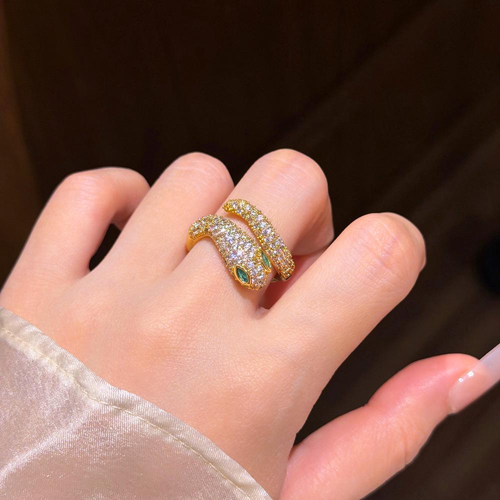 Korean Elegant Snake Ring: Luxurious Full Diamond with Green Eyes and Zircon Inlay for Women.