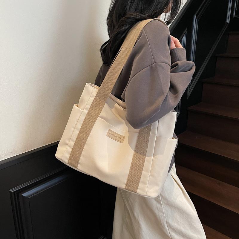 New portable canvas shoulder bag women's bag large capacity multi-bag fabric bag leisure work solid color tote bag
