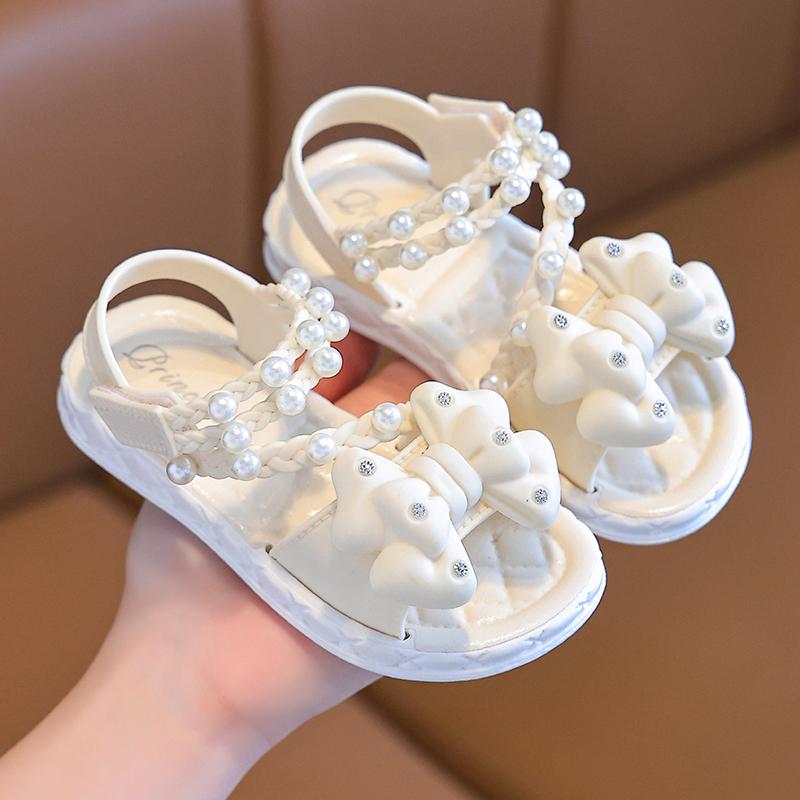 

Новые летние шлепанцы для девочек 1-7 лет, с бантом и жемчужным украшением, плоская подошва, детские тапочки, нескользящие, для улицы, пляжа, шлепанцы, детская обувь 22 бежевый