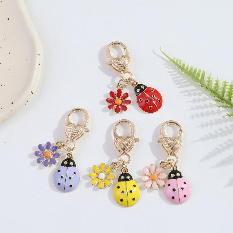 Portable Functional Charm Featuring Artistic Ladybird and Daisy Design for Various Decorative Uses On Essential Item
