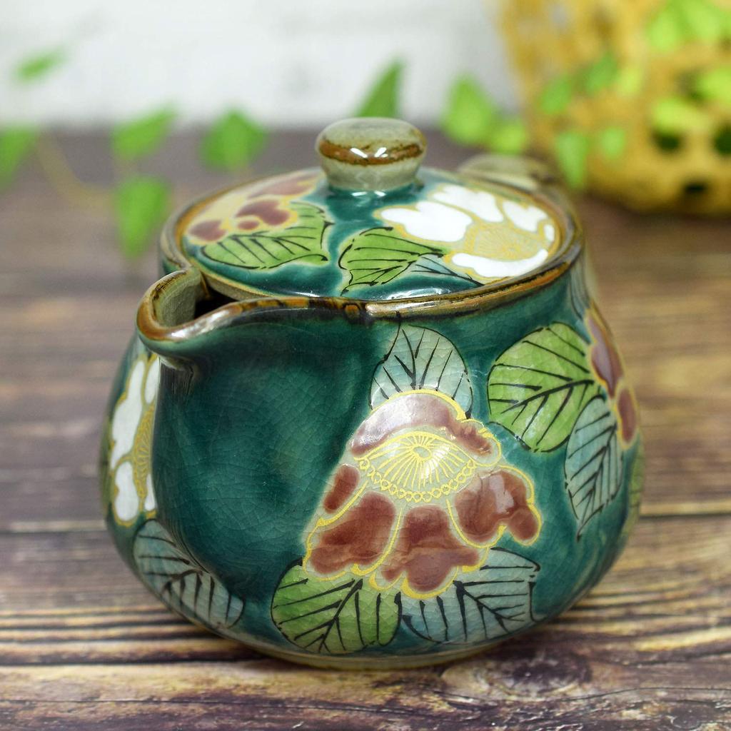 Waza no Kura Stilvolle Teekanne aus Kutani-Ware mit grünem Kamelien-Design und Teesieb. Hergestellt in Japan. Ein hochwertiges Keramikgeschirr und perfekt als ein