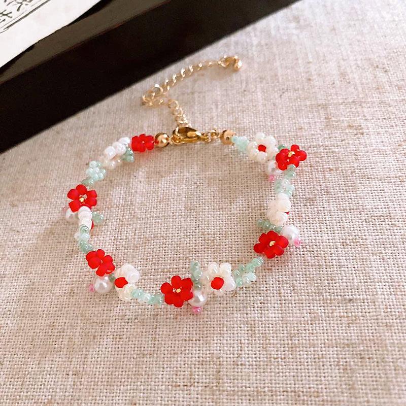 Small fresh flower rice bead pearl bracelet female sweet girl heart bracelet niche simple high-end jewelry