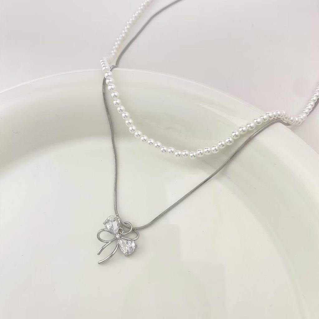 Elegant Double-Layer Pearl Bow Knot Necklace - Chic & Stylish Statement Clavicle Chain