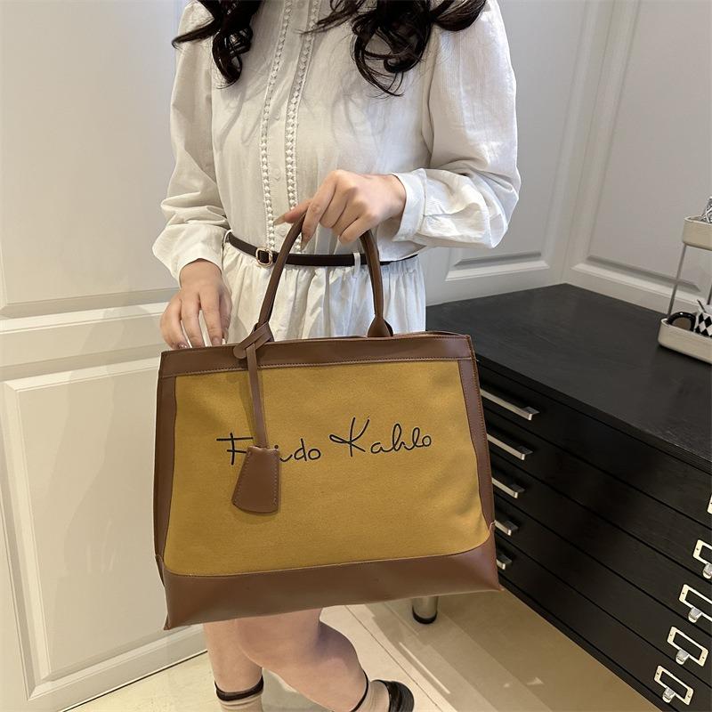 Casual retro high-end portable large-capacity bag women's new trendy fashion contrasting colors commuter hand carry tote bag