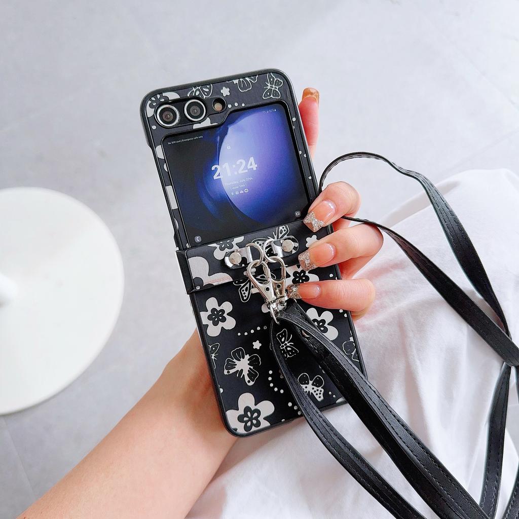 For Samsung Galaxy Z Flip7 FE 5G/Z Flip6 5G Butterfly and Flower Pattern PU Leather Coated PC Phone Cover with Crossbody Strap