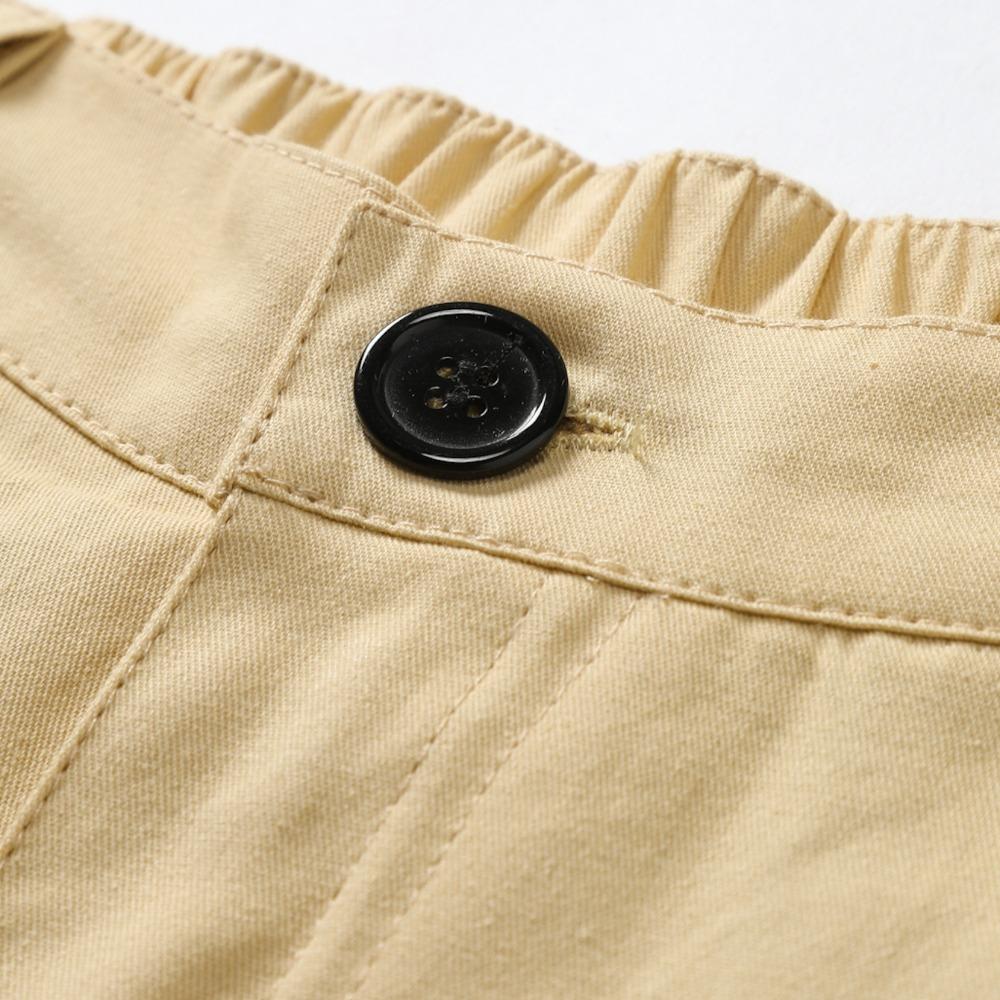 2025 Novos shorts masculinos casuais para praia ao ar livre com vários bolsos, moda cor sólida, shorts de praia para férias masculinos