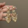 Diamond Inlaid Silver Needle Teardrop Earrings - Elegant Court-Style Jewelry with a Luxurious Touch.
