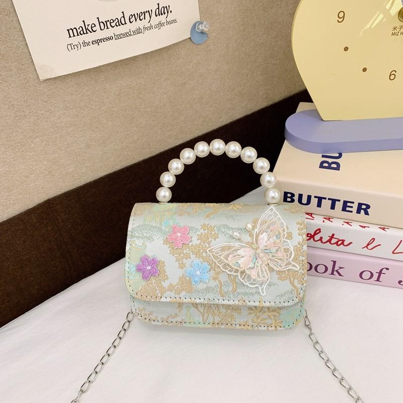 And Versatile Elegant Childrens Handbag With Chic Chain Detail And Charming Scenery Print