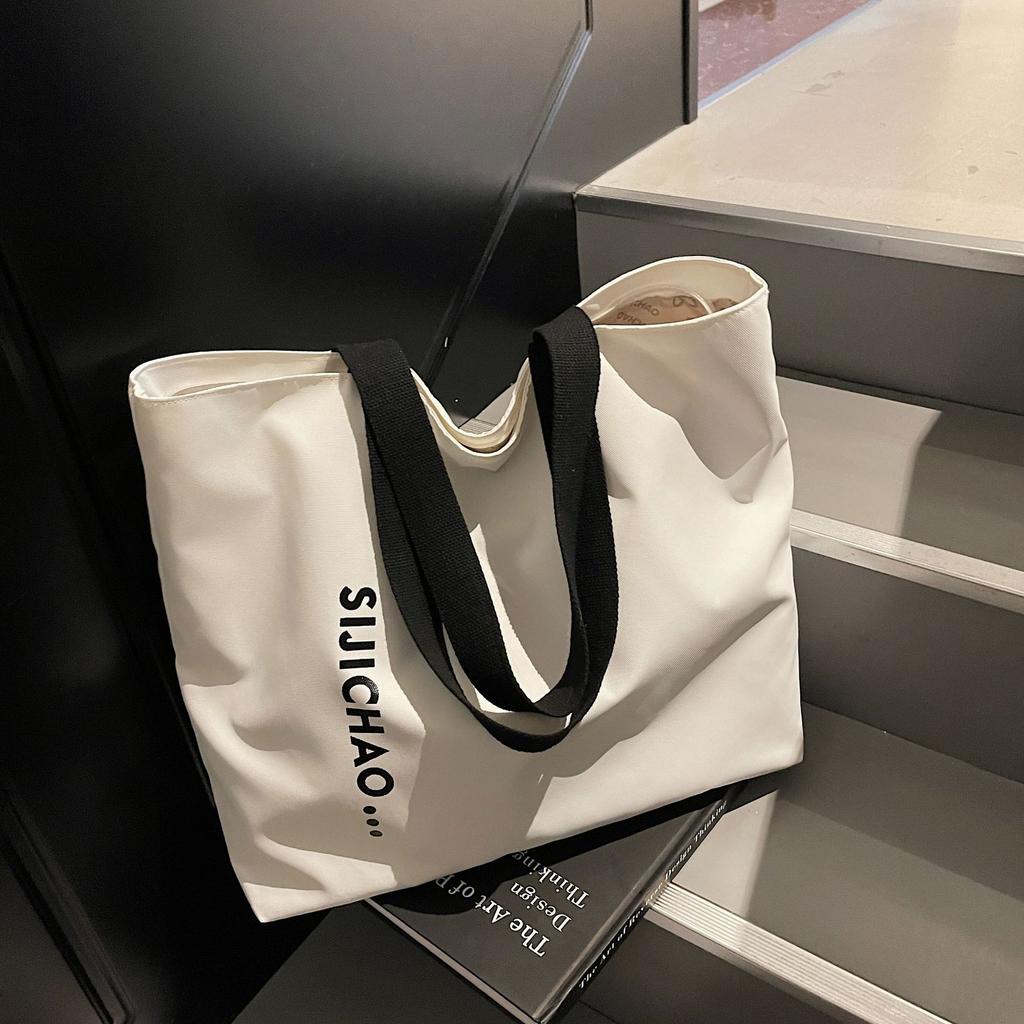 Dámská nová látková ležérní módní nákupní taška s potiskem písmen a texturou, velkokapacitní taška přes jedno rameno