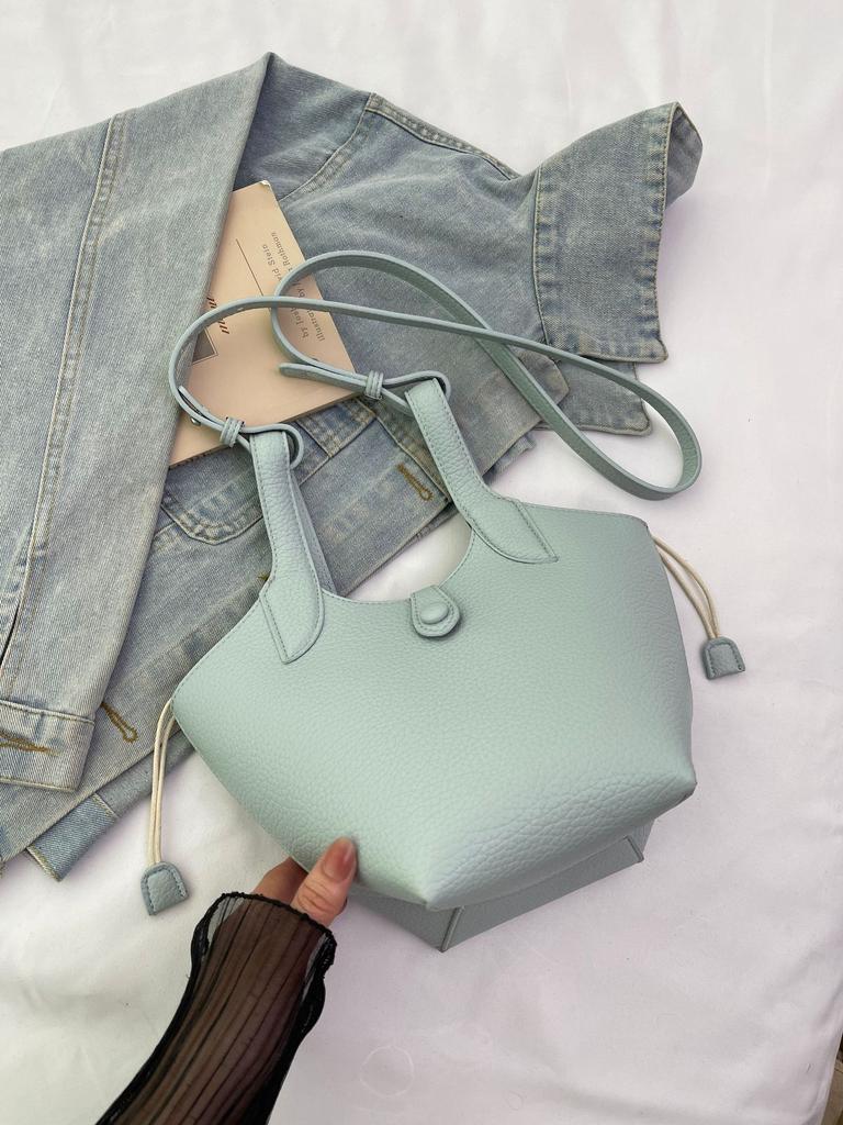 2025 New Versatile Niche Design Vegetable Basket Women's Bag High-end Texture Commuter Portable Messenger Bag Women's Trend