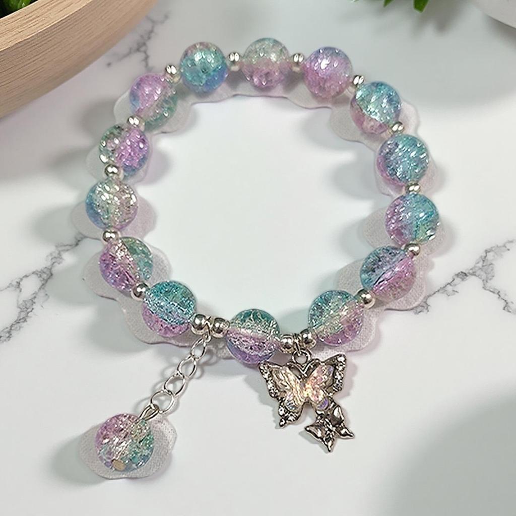 Braccialetto in Vetro Fiore Esplosione Fantasy da 10 mm: Ciondolo Farfalla Colore Degradé Design di Nicchia per Donne e Migliori Amiche.