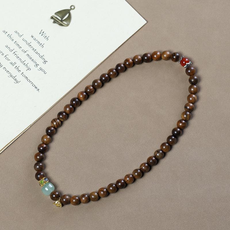 Women's Black Pearwood 8mm Double-Strand Bracelet with Aventurine Lotus Seed Pod Pendant - Retro Buddhist Beads Jewelry for Couples.