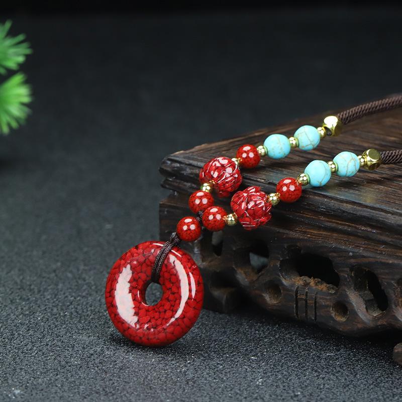 Red Agate Cinnabar Acacia Bean Necklace with Cat's Eye Gold Thread Clavicle Chain.