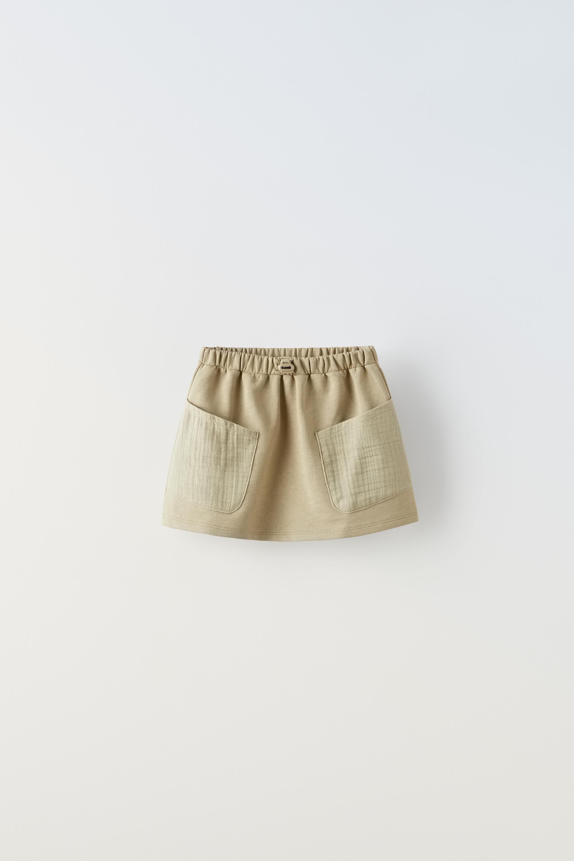 

ФУТБОЛКА В РЕБРИКУ С ОРУШАМИ