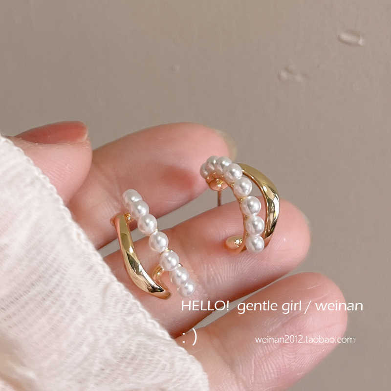 

Korean simple fashion circle pearl earrings women s ins style niche design high-end versatile stud earrings