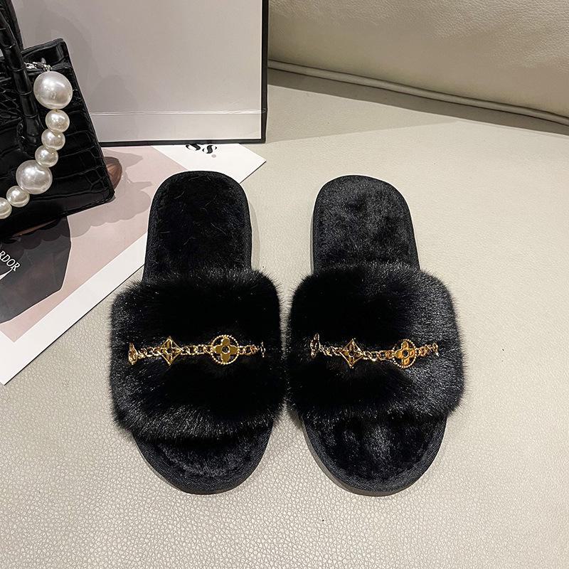 

Жіночі модні хутряні тапочки на металевому ланцюжку - стильні шльопанці на плоскій підошві для дому, осені та зими. 40/41 чорний